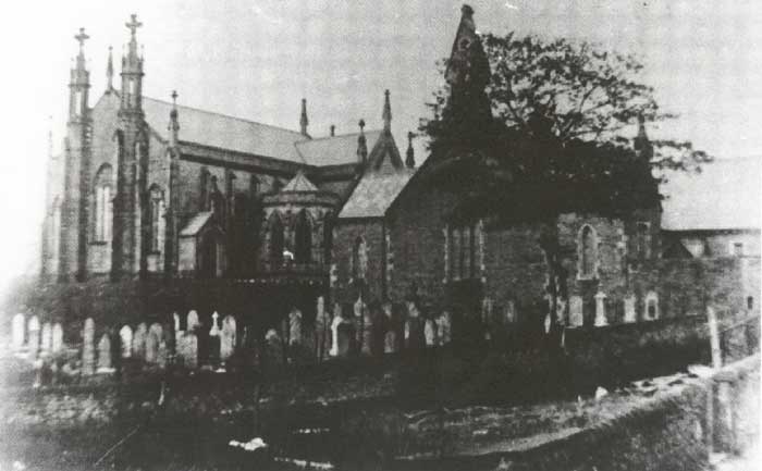 Rowlands Wesleyan Chapel, late nineteenth century, with surrounding graves
